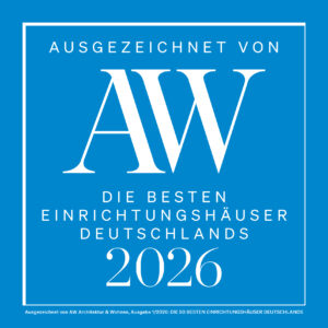 Blaue und weiße Grafik mit Text: Ausgezeichnet von AW - Die besten Einrichtungshäuser Deutschlands 2026, darunter Möbel Braum.