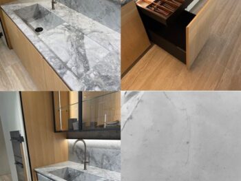 Molteni Abverkauf, Outlet, Angebot: Moderne Küche mit Marmorarbeitsplatten und -rückwand, Metallarmatur, organisierter Utensilienschub, großer ausziehbarer Stauraum und eine Nahaufnahme des Metalllogos von Dada by Molteni&C auf der Marmoroberfläche.