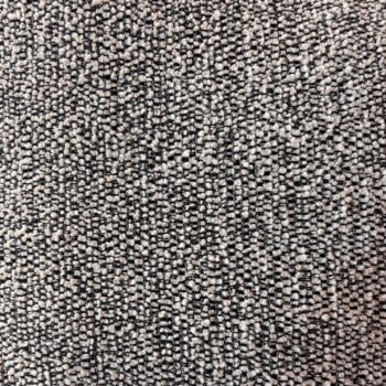 Nahaufnahme eines strukturierten Stoffes mit einem dichten Webmuster in Grau- und Beigetönen, das an den edlen Bezug eines Vitra-Sofas erinnert.